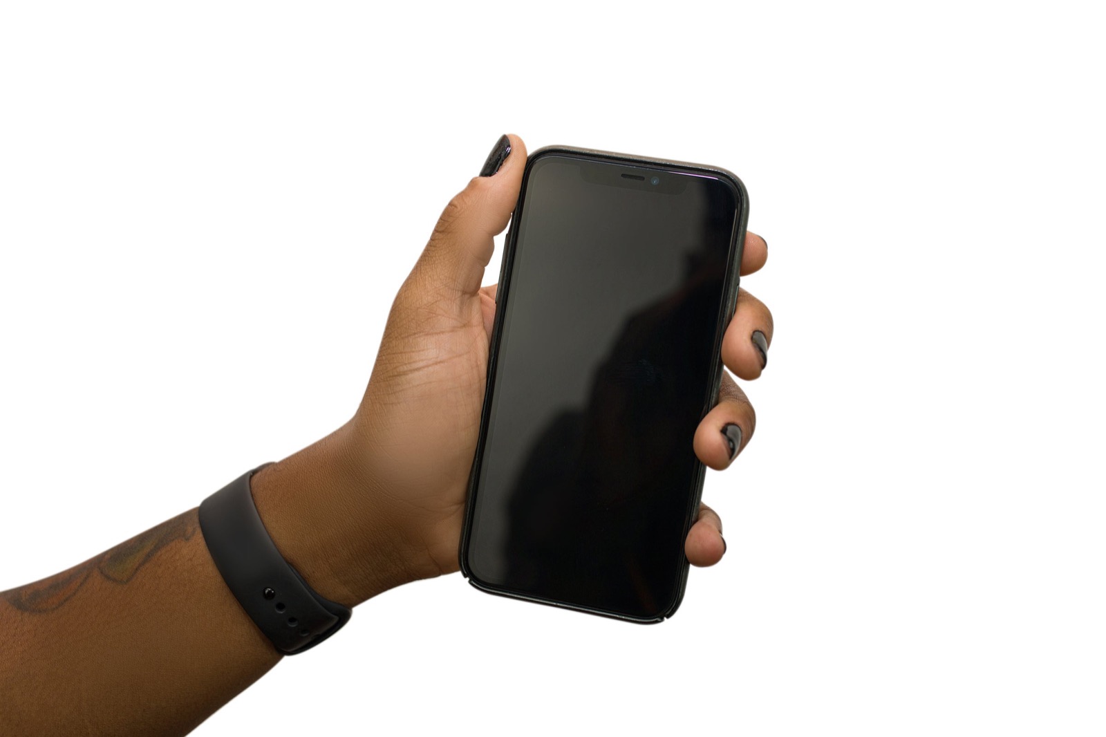 Hand holding a phone ready for a salon booking